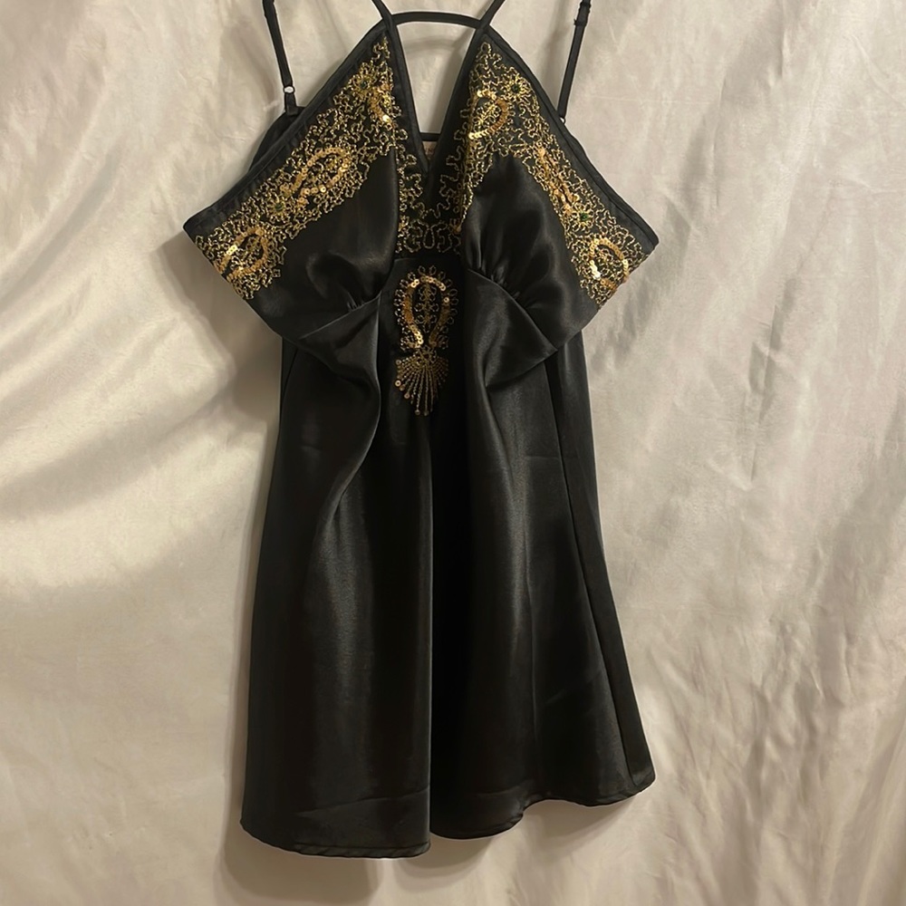 Blusa negro y gold